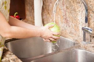 rinsing-lettuce-kitchen-sink